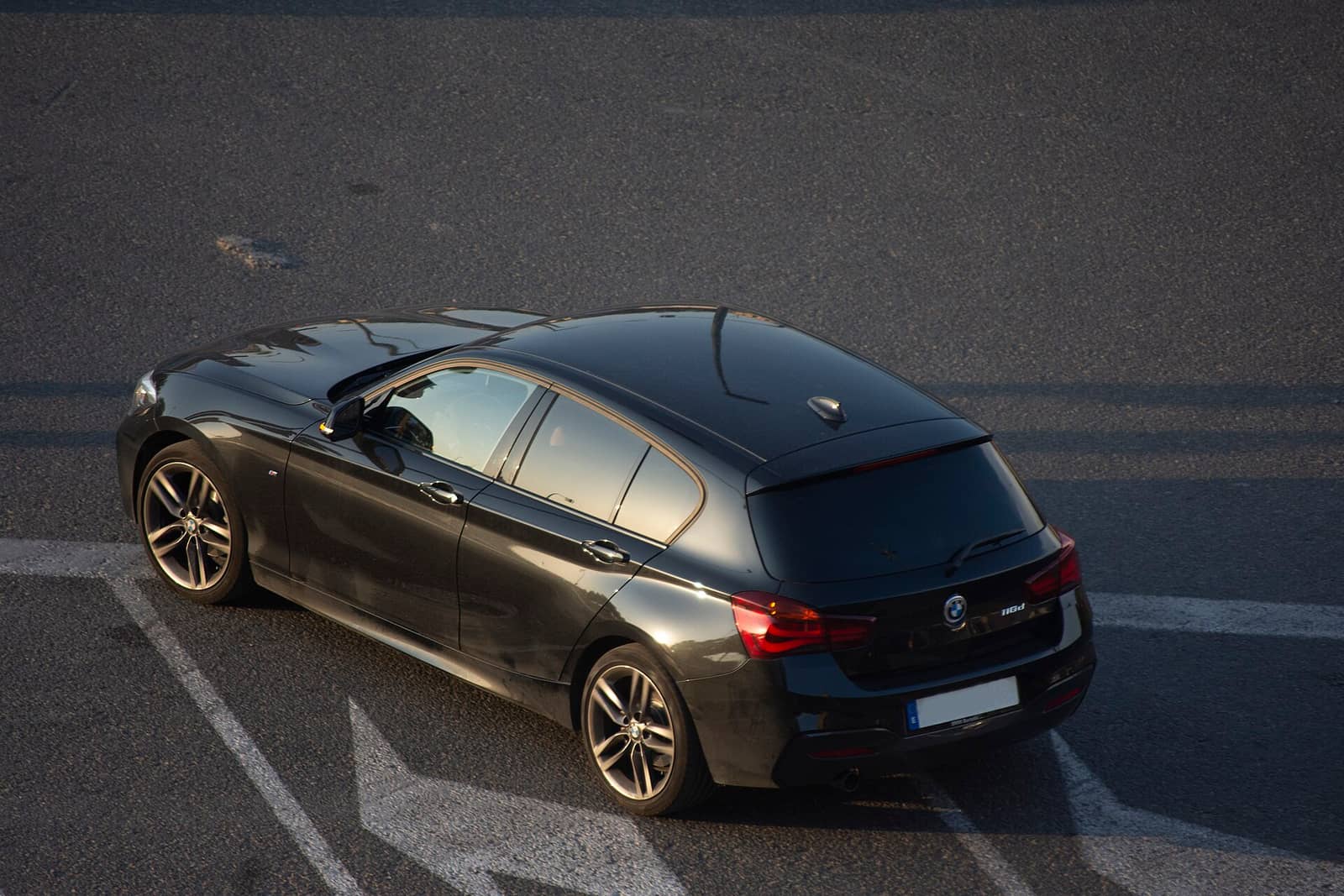 Black BMW 116d, rear view from above