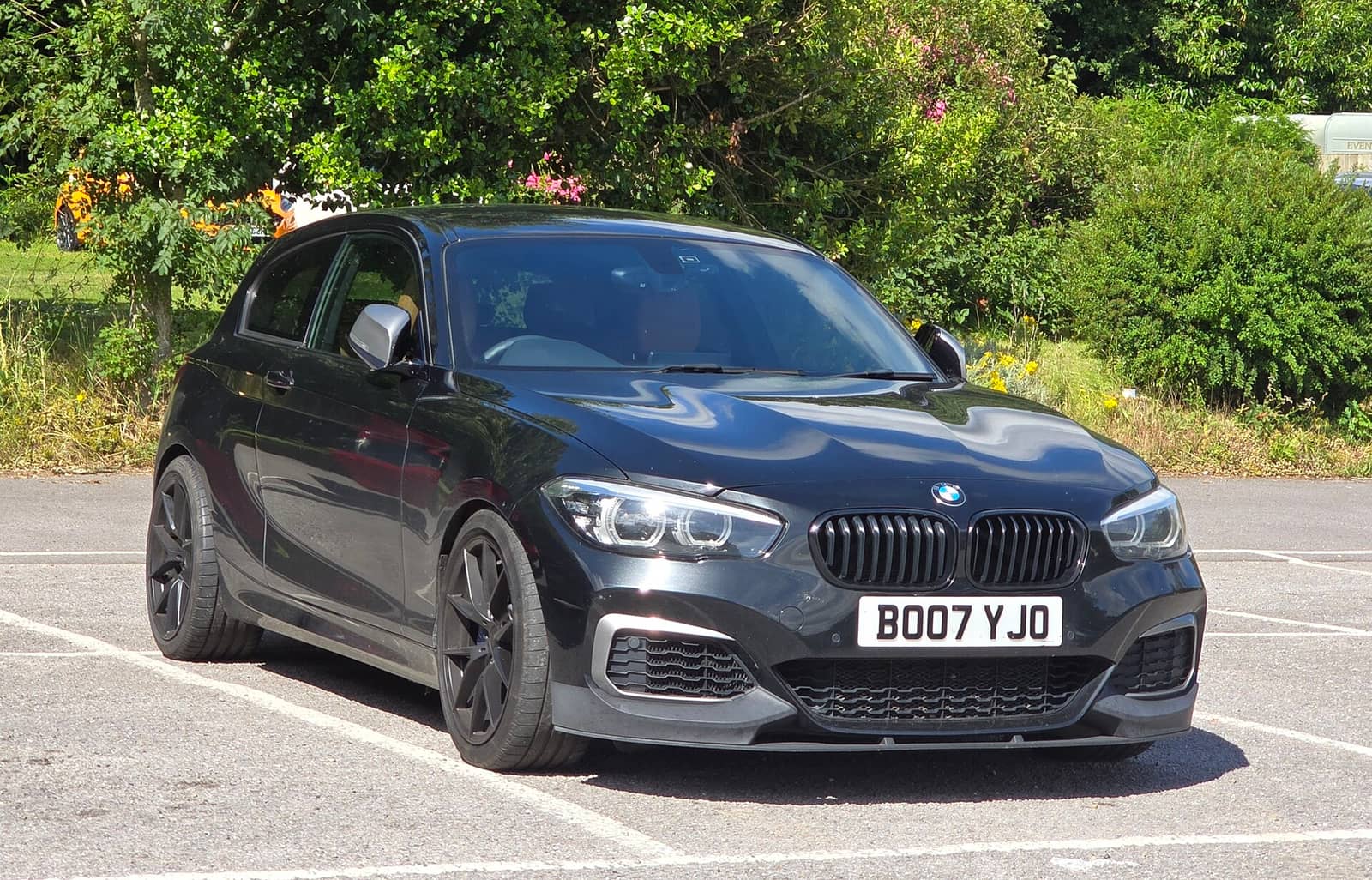 Black BMW M140i Shadow Edition, front view