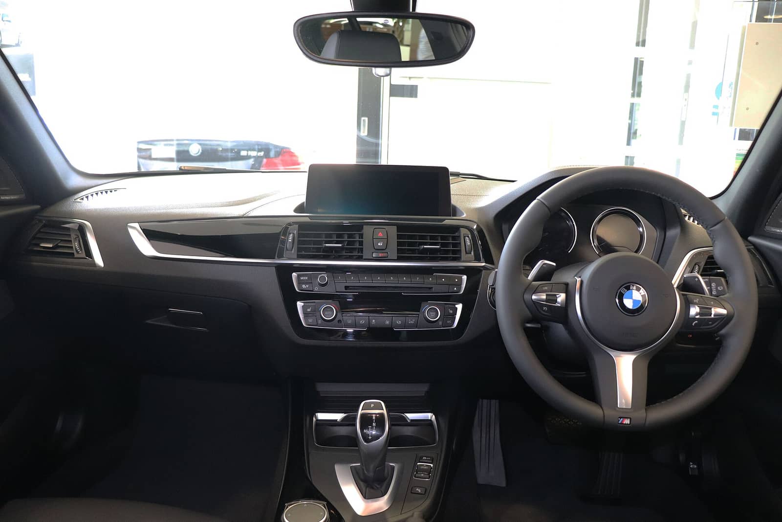 BMW M140i Shadow Edition interior with M Sport steering wheel